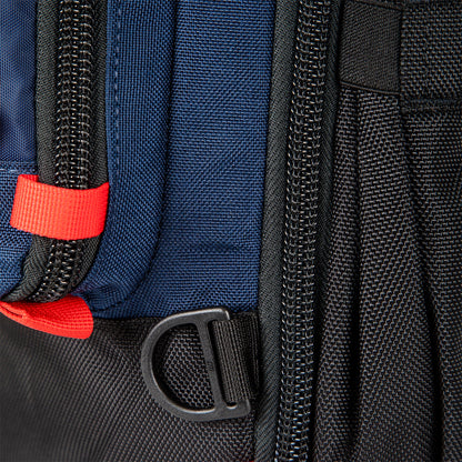 General shot of Topo Designs Global Travel Bag 30L Durable Carry On Convertible Laptop Travel Backpack in Navy blue showing attachment points and locking zippers.