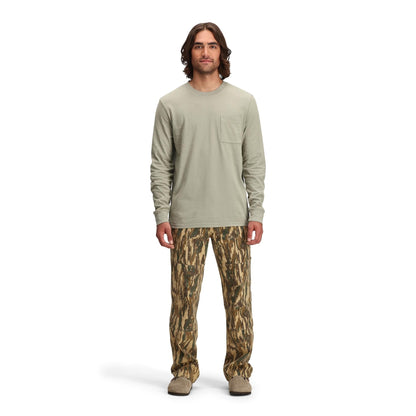 Front model shot of Topo Designs Dirt Pocket Tee Long Sleeve - Men's in "Dried Sage"