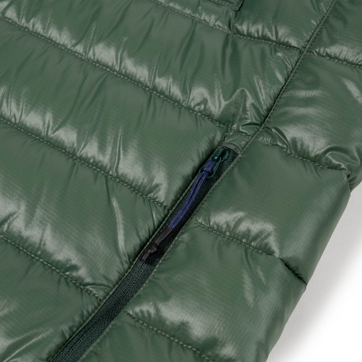 General Detail shot of Topo Designs Townie Puffer Jacket - Men's in "Forest"