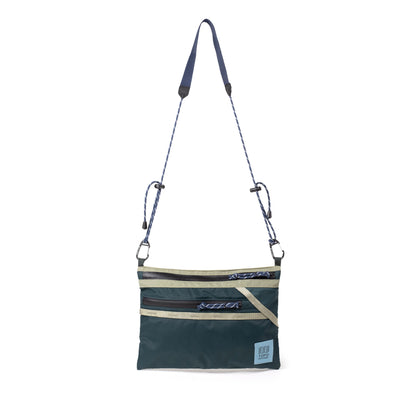 Front View of Topo Designs Mountain Accessory Shoulder Bag in "Oil Green / Dark Pine"